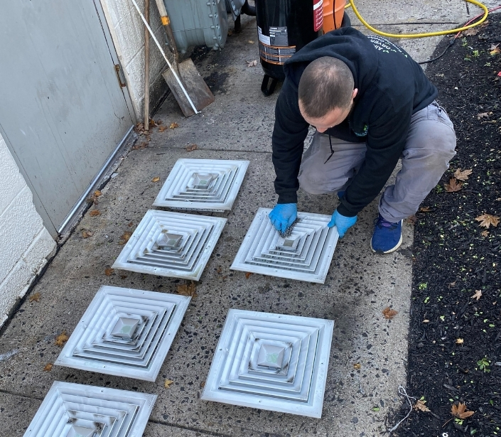 Home air duct inspection process in New Jersey demonstrating technician's attention to detail and quality service measures