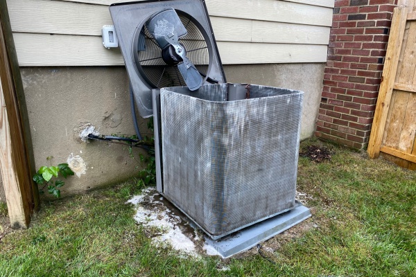 Cleaning a blower motor unit outside a home in New Jersey to ensure optimal air circulation and system efficiency Cleaning a blower motor unit outside a home in New Jersey to ensure optimal air circulation and system efficiency