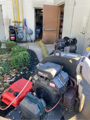 Duct coil blower service in progress outside a service facility Duct coil blower service in progress outside a service facility